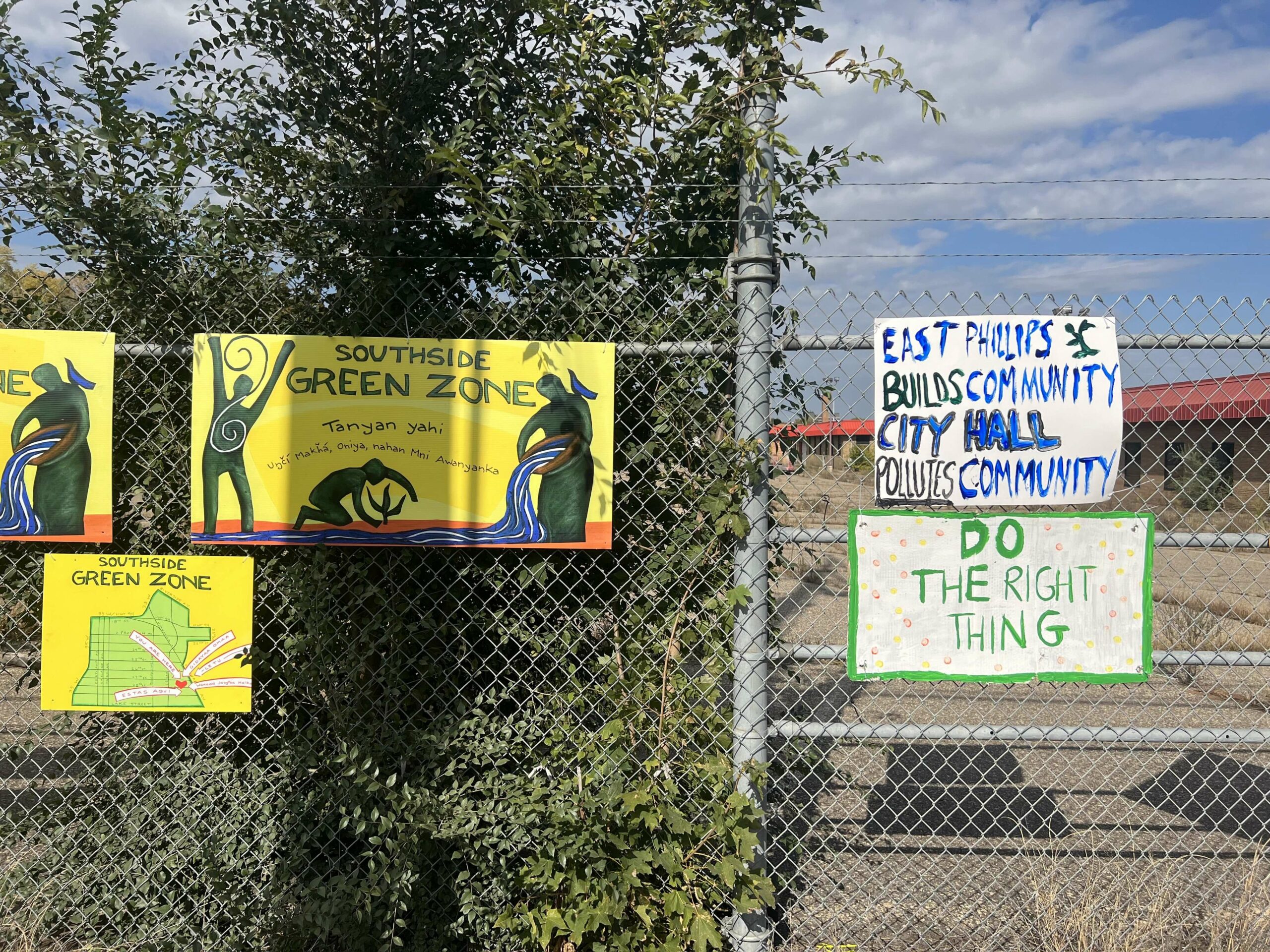 Home made agitprop on a chain link fence